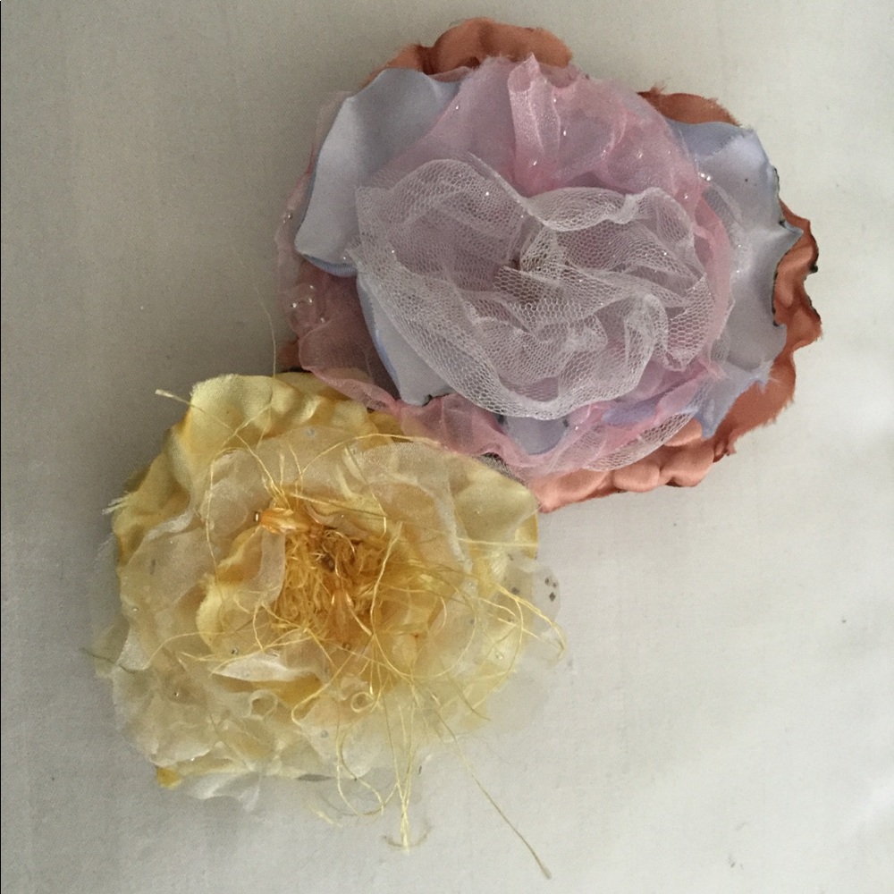 A set of two vintage-inspired flower pins